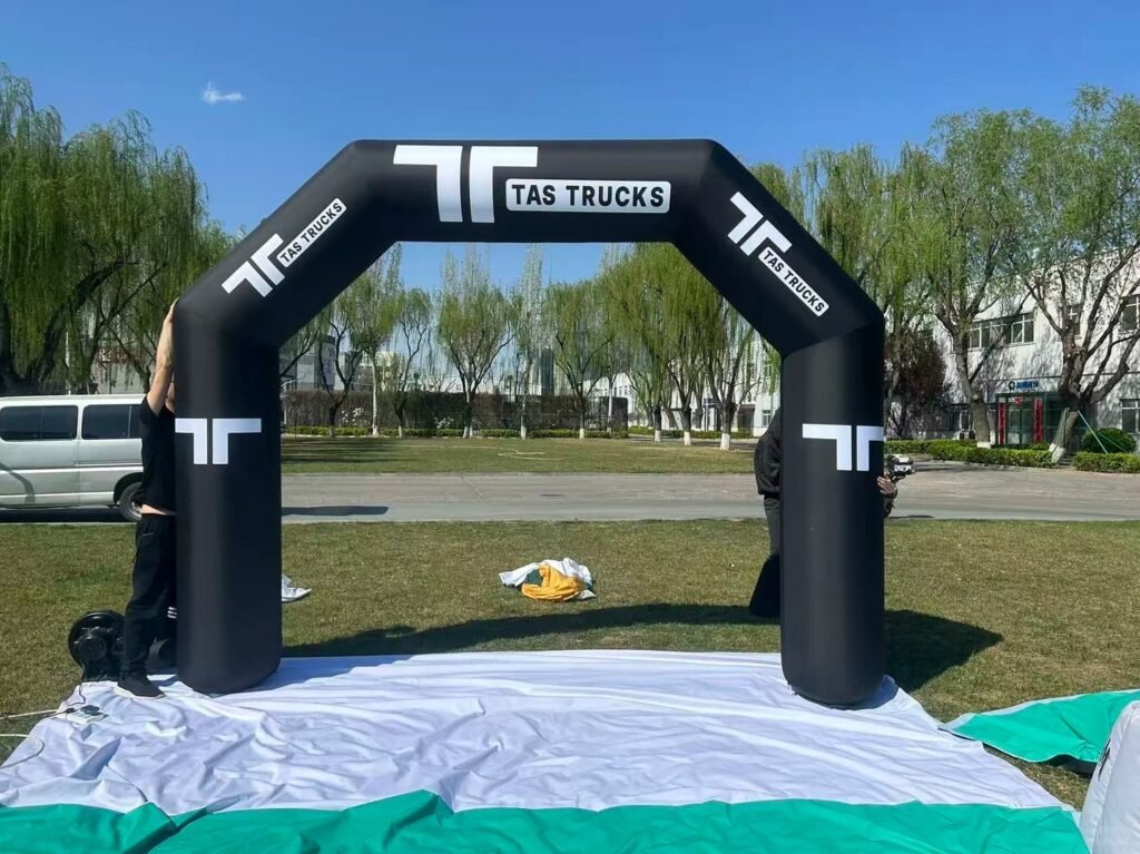 Black TAS TRUCKS inflatable promotional arch