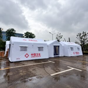 White inflatable medical tents joined by a central entrance