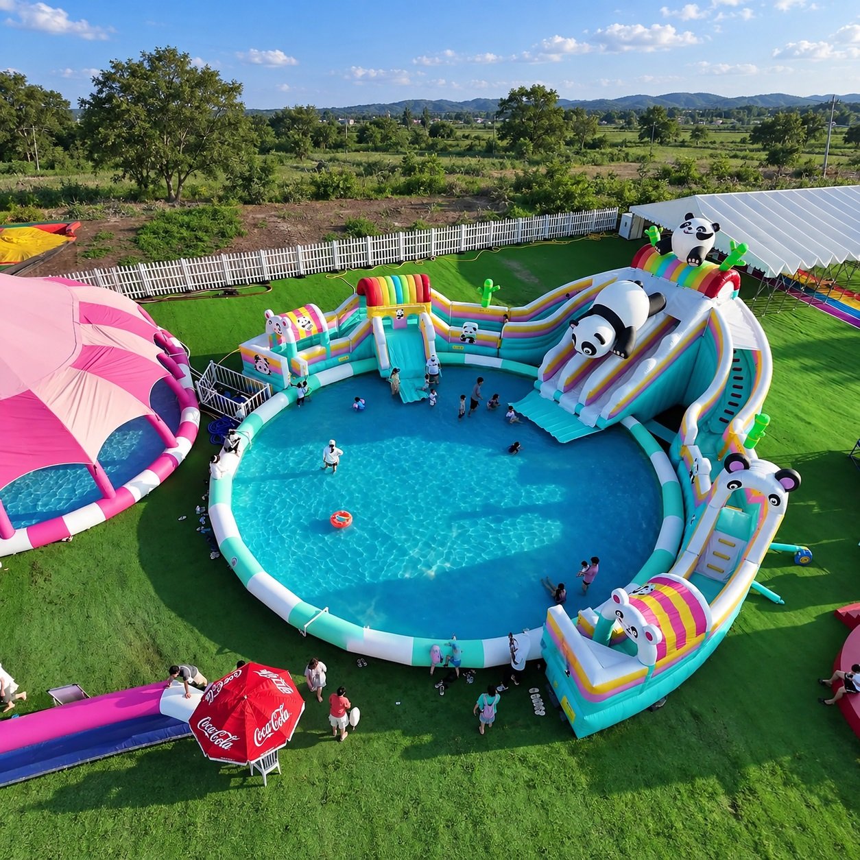 Round inflatable pool with a panda-themed slide and pastel walls