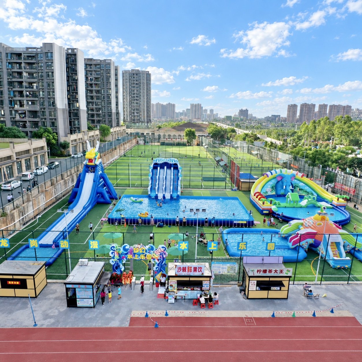 Inflatable water park with tall blue slides beside apartment buildings